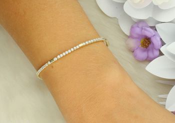 Bransoletka tenisowa Nomination Italy z kolekcji Petit Sparkle. Srebro 925 pozłacane 18K złotem, zdobiona cyrkoniami. Regulowana długość 16,5–19,5 cm. Oryginalna biżuteria idealna na prezent! (2).jpg